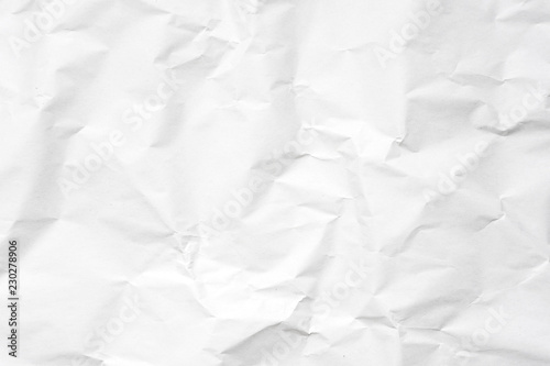 White crumpled paper texture background.