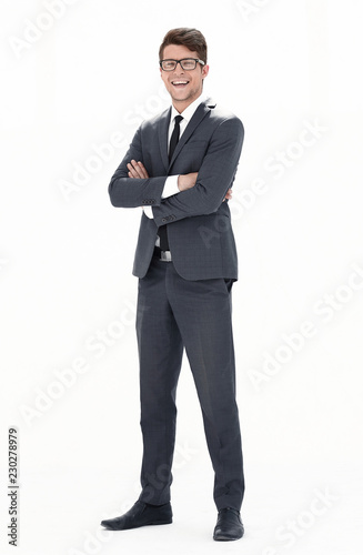 in full growth. young businessman with glasses