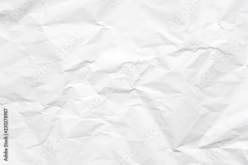 White crumpled paper texture background.