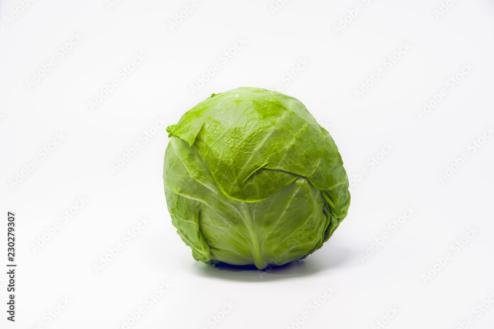 Green cabbage head isolated on white background. Green cabbage head isolated on white background.
