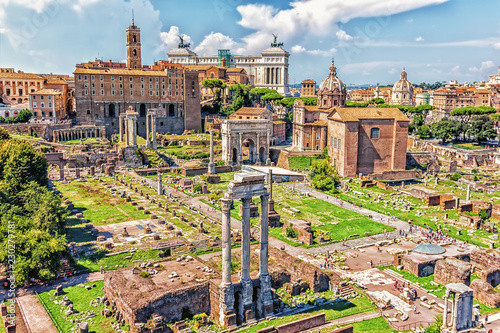 View on the Roman Forum: the Temple of Castor and Pollux, the Arch of Septimius Severus, the Temple of Saturn, the Temple of Vespasian and Titus and Basilica Aemilia photo