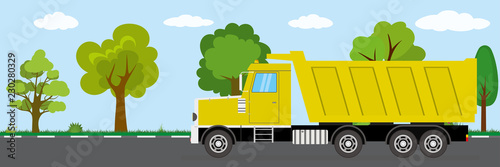 tipper truck on road,nature landscape on background,