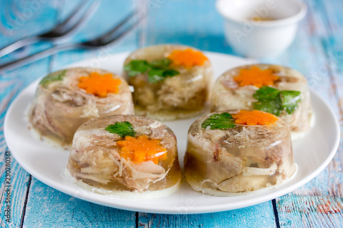Aspic jellied meat with vegetables, traditional russian dish holodets