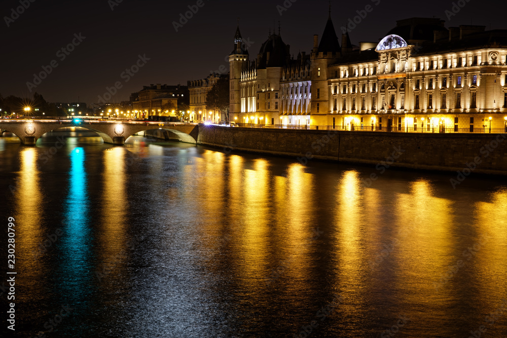 Fototapeta Paris, France - October 21, 2018: Conciergerie and river Seine in Paris