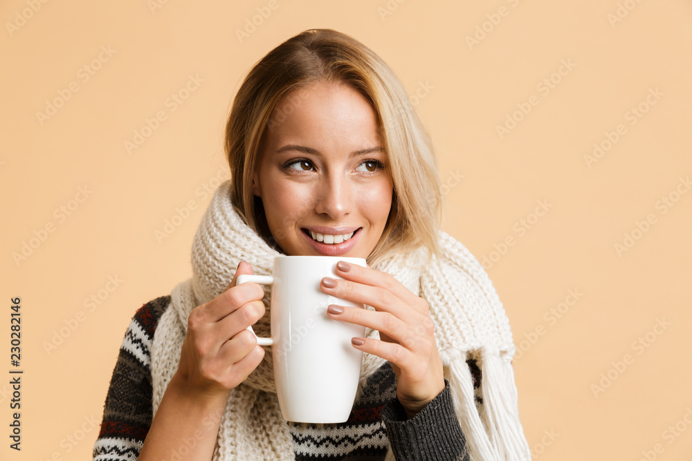 Close up portrait of a happy girl dressed in sweater Close up portrait of a happy girl dressed in sweater