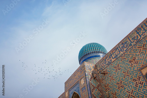 The Mausoleum of Khawaja Ahmed Yasawi. Ancient mosque in the city of Turkestan. UNESCO World Heritage Site in Kazakhstan. Dome of the ancient mausoleum. photo