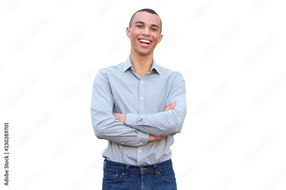 handsome young man smiling with arms crossed against isolated white background handsome young man smiling with arms crossed against isolated white background
