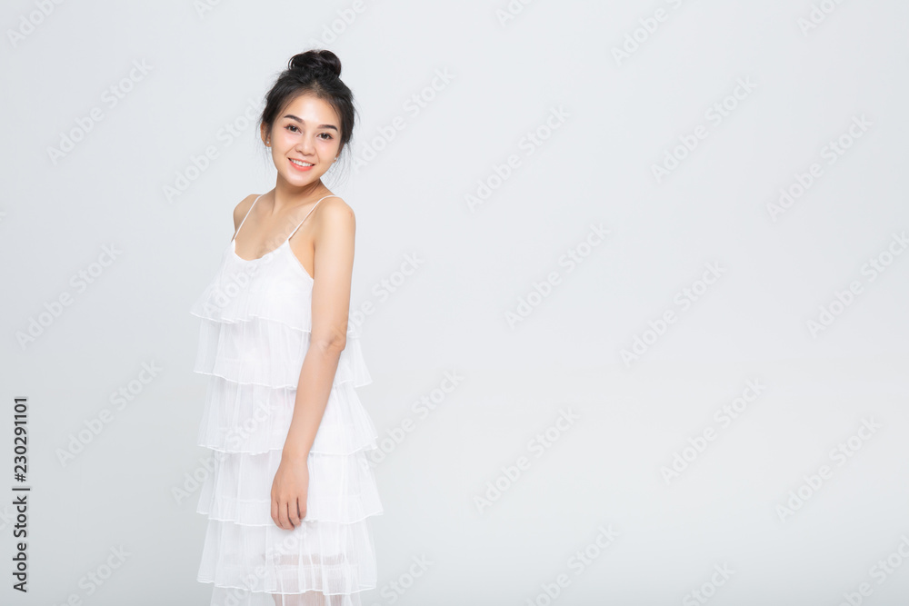 Woman in white dress clothing beauty cute face summer spring collection on white background Woman in white dress clothing beauty cute face summer spring collection on white background