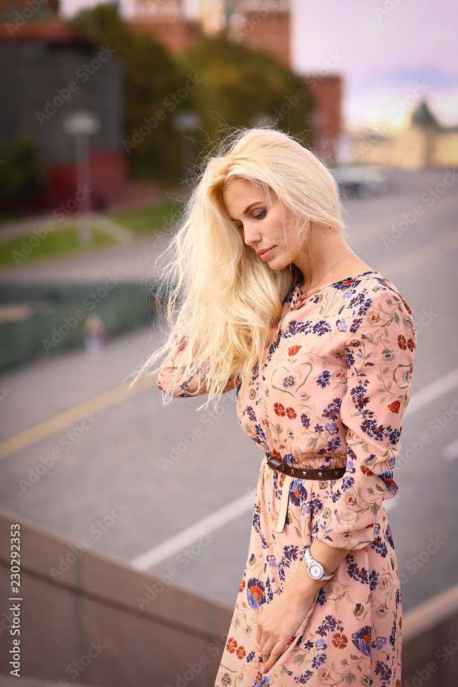 Fototapeta premium blond fashion model russian girl close up photo on red square background