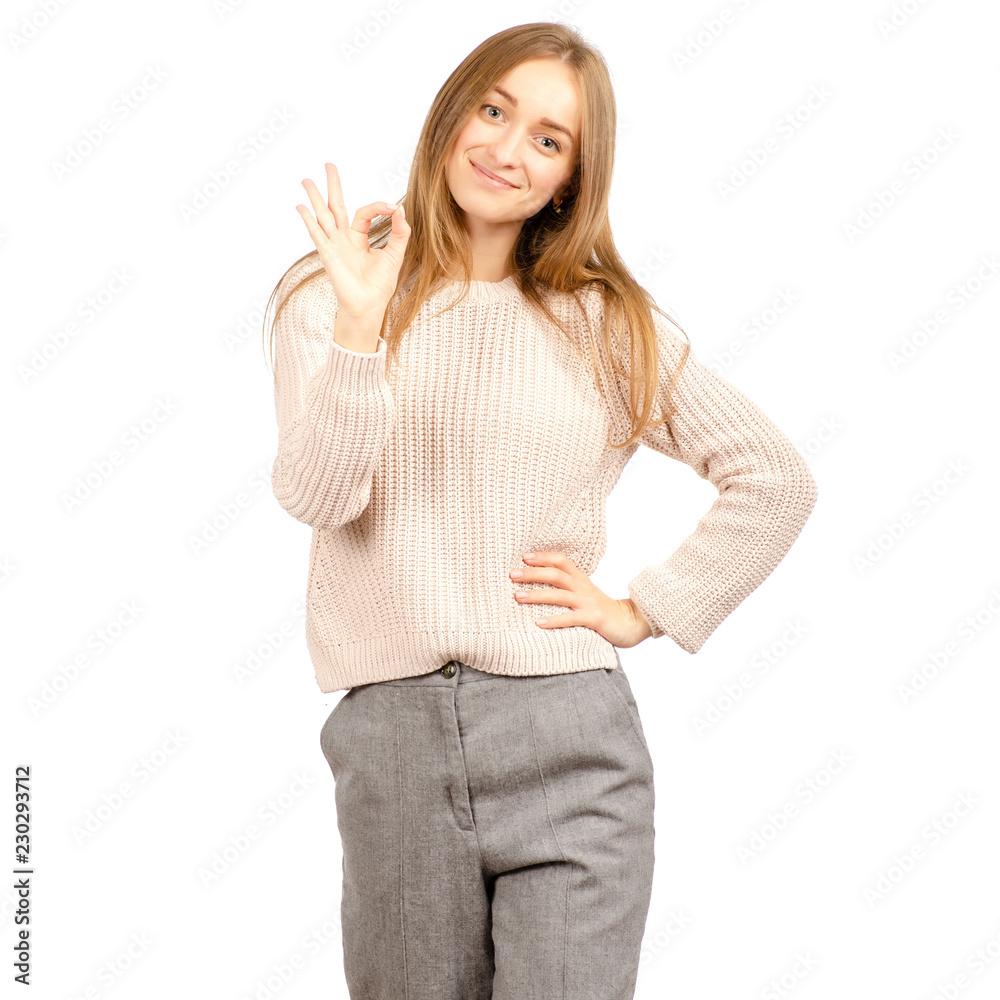 Beautiful woman in a sweater okay on a white background. Isolation Beautiful woman in a sweater okay on a white background. Isolation