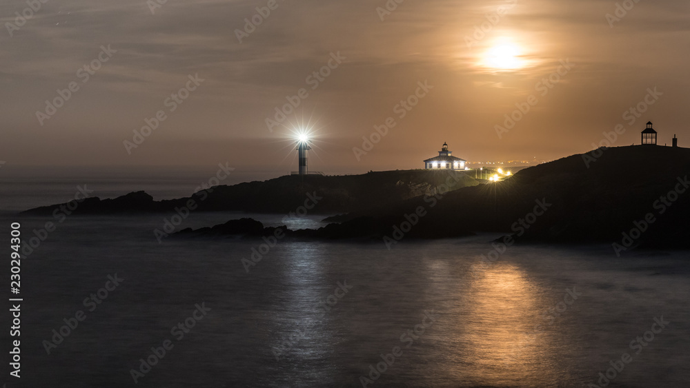 Full moon accompanying the lighthouse!