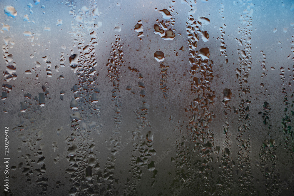 drops on a misted window drops on a misted window
