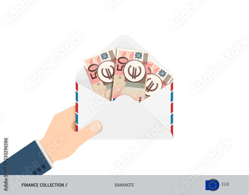 50 Euro Banknotes in envelope hold in hand. Flat style opened white envelope with cash. Salary payout or corruption concept.