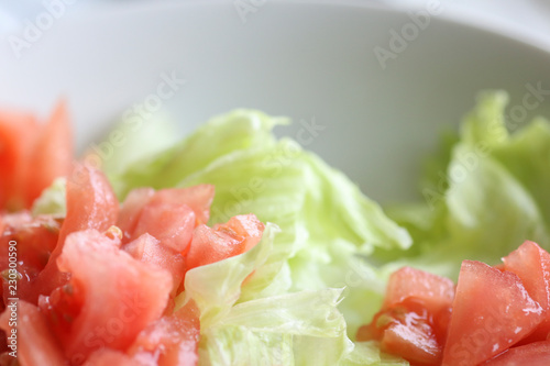 Close up of a delicious tomatoes and lettuce salad