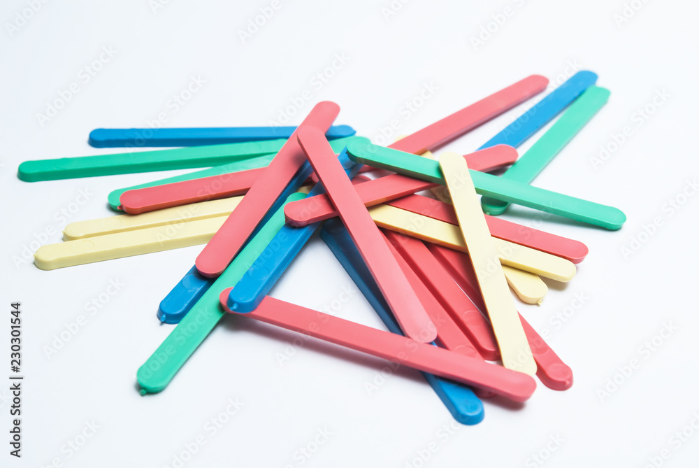 multicolored counting sticks on white background multicolored counting sticks on white background
