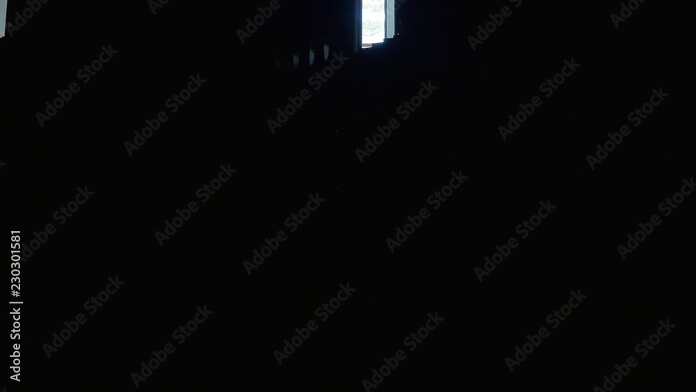  Lights turn off then on inside an empty university classroom.