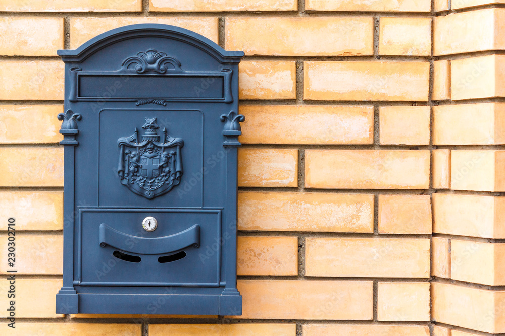 A beautiful mailbox hangs waiting for newspapers, parcels and letters. A beautiful mailbox hangs waiting for newspapers, parcels and letters.