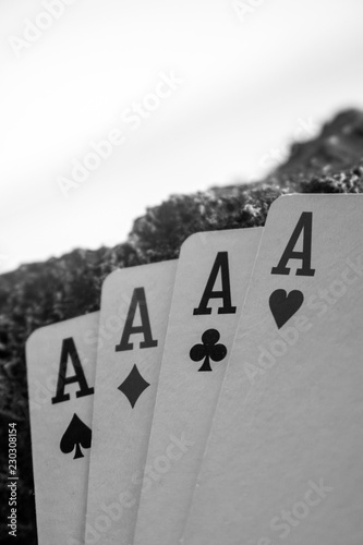 four of a kind ace poker card gamble black and white theme photo