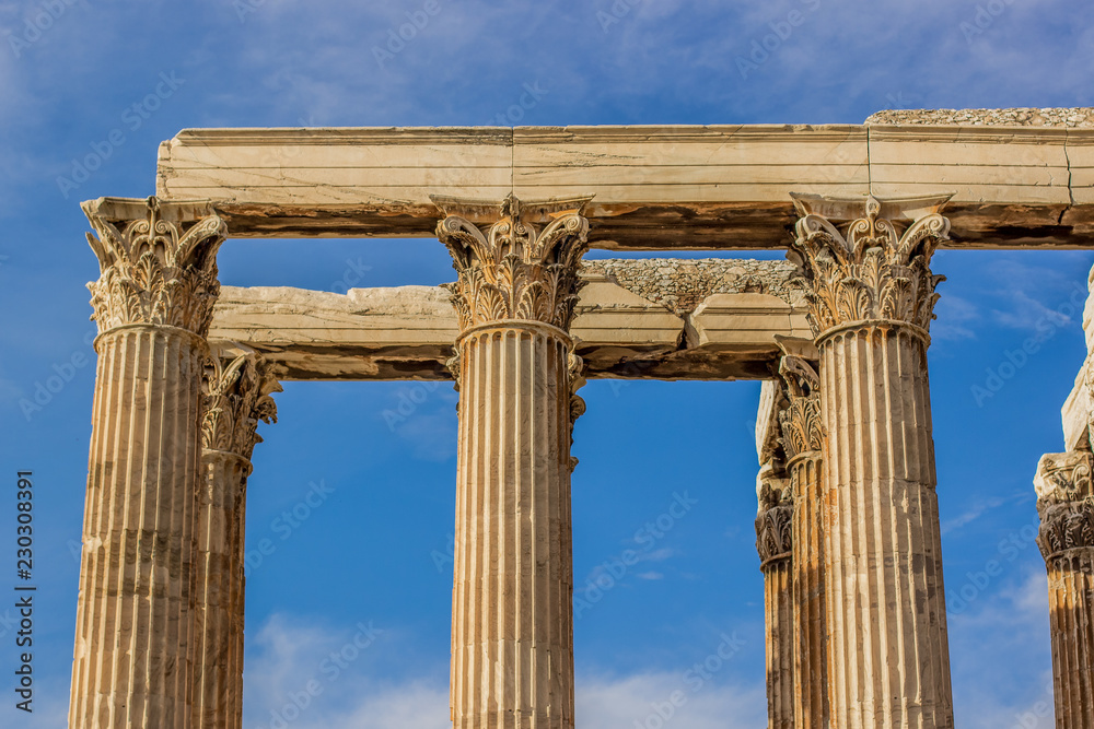 Greek open outdoor museum ancient antique ruins and marble columns on blue vivid sky background, copy space 