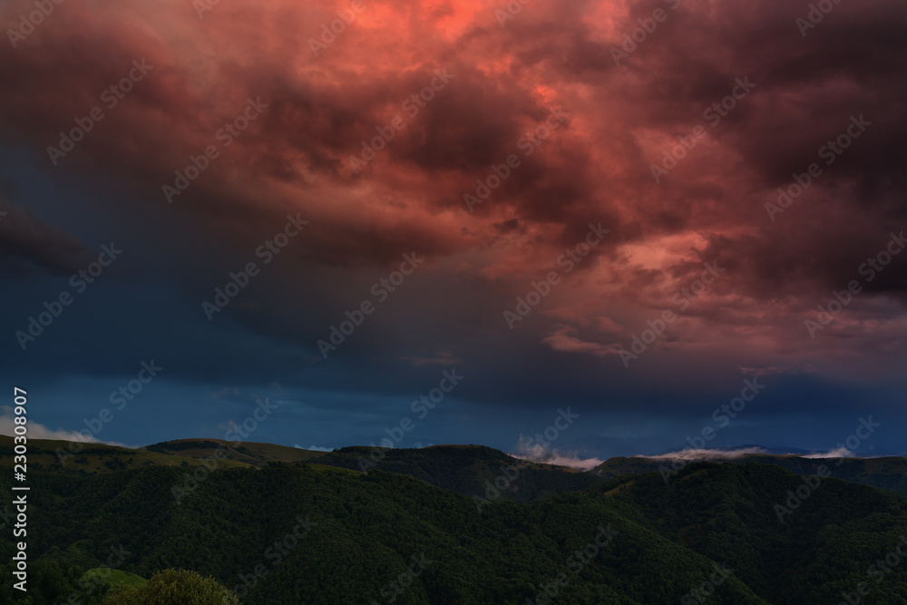 The sky at sunset over the hills in the foothills of the North Caucasus in Russia. The sky at sunset over the hills in the foothills of the North Caucasus in Russia.