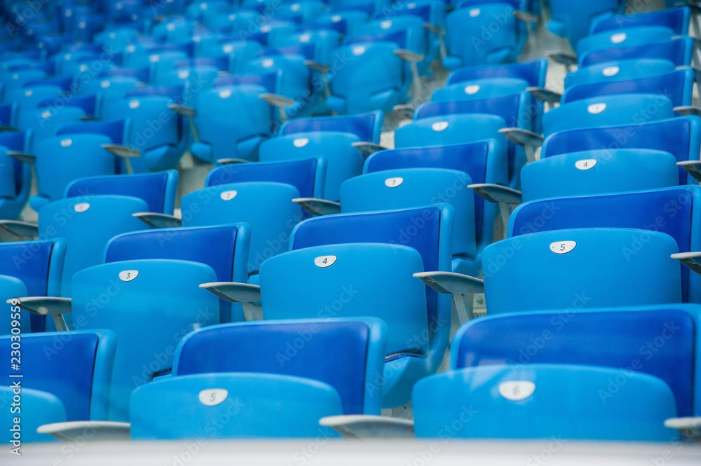 Naklejka premium Empty blue seats in stadium