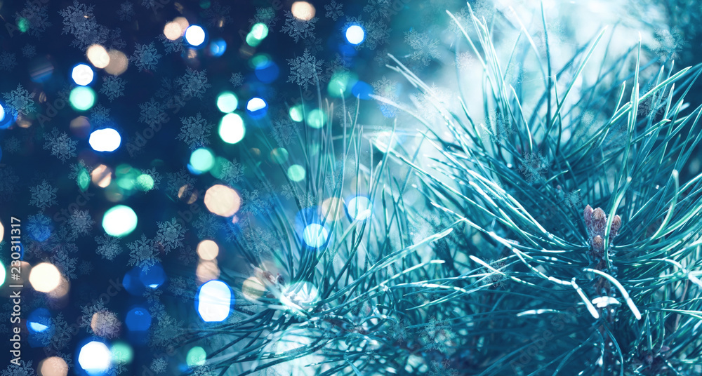 Christmas background with fir branches, glow, snowflakes and bokeh. Christmas background with fir branches, glow, snowflakes and bokeh.
