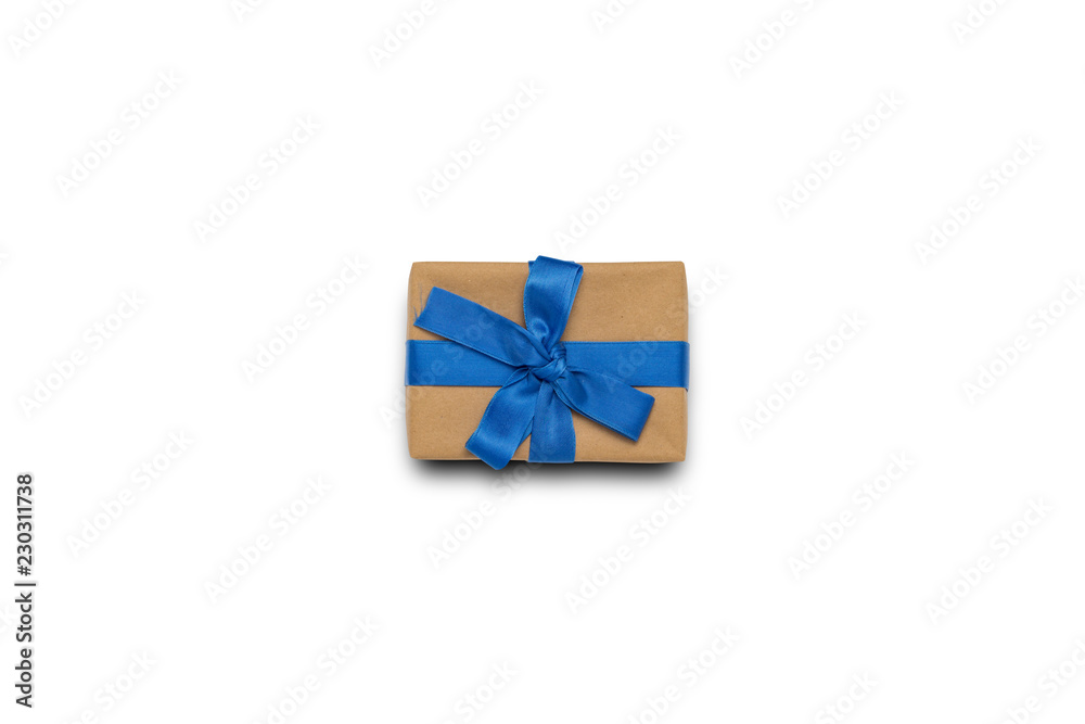 Gift box with blue ribbon on white isolated background. Gift concept for a loved one, for a holiday, birthday, congratulations. Flat lay, top view Gift box with blue ribbon on white isolated background. Gift concept for a loved one, for a holiday, birthday, congratulations. Flat lay, top view