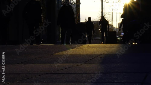 people walk street city backlight