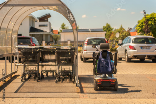People with limited mobility can actively participate in life thanks to electric wheelchairs. Concept: social issues or health