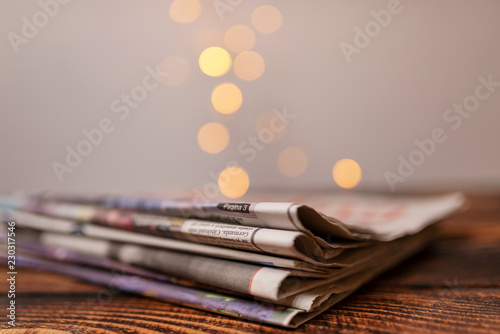 news concept with a pile of newspapers