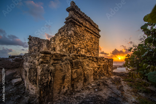 ancient mayan temple at sunrise in Cancun Mexico