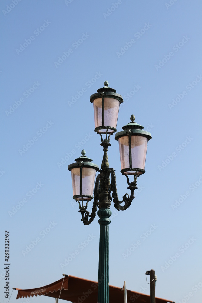 street lamp on blue sky background