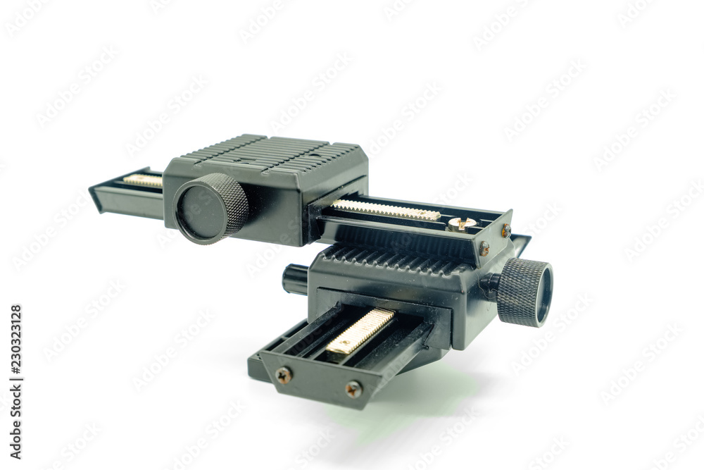 Macro Focusing Rail Isolated on a White background. Macro Focusing Rail Isolated on a White background.