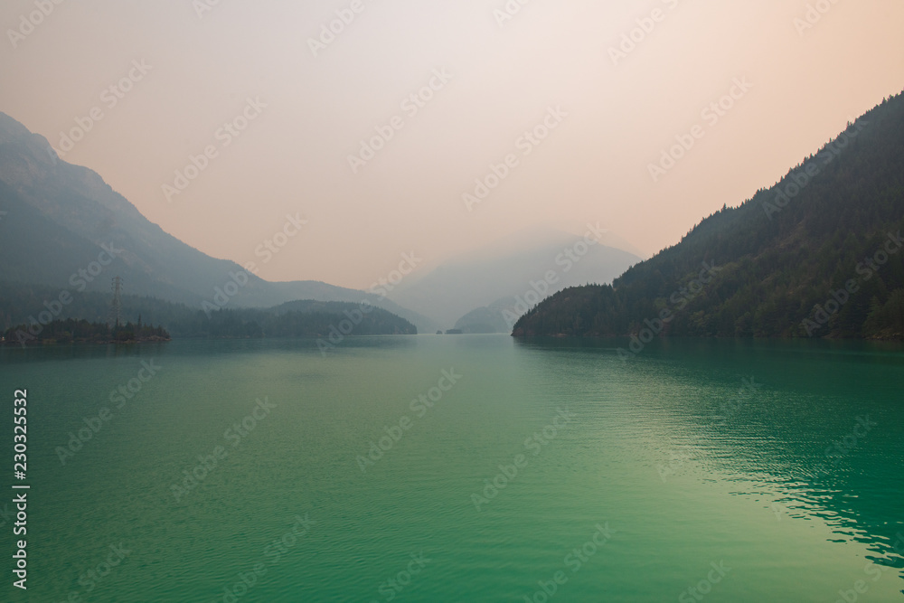 Wildfires creating smokey skies above Diablo Lake in the North Cascades National Park