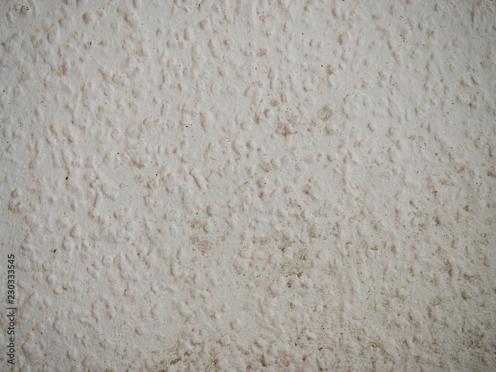 Wall covered with typical German wallpaper with wood chips for structure, so called Raufastertapete, covered with dirt and dust before renovation in demolished apartment Wall covered with typical German wallpaper with wood chips for structure, so called Raufastertapete, covered with dirt and dust before renovation in demolished apartment