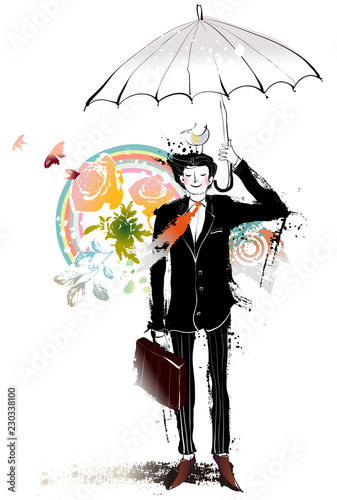 Businessman holding a briefcase and umbrella