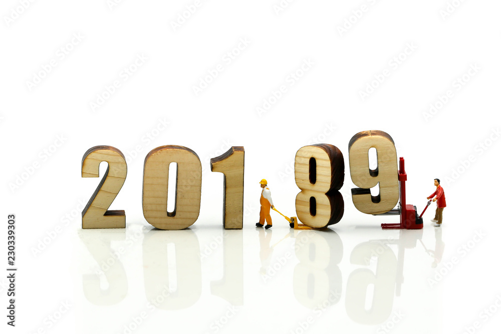 Miniature people : Worker with wooden of number 2019,Happy New Year 2019 concept. Miniature people : Worker with wooden of number 2019,Happy New Year 2019 concept.