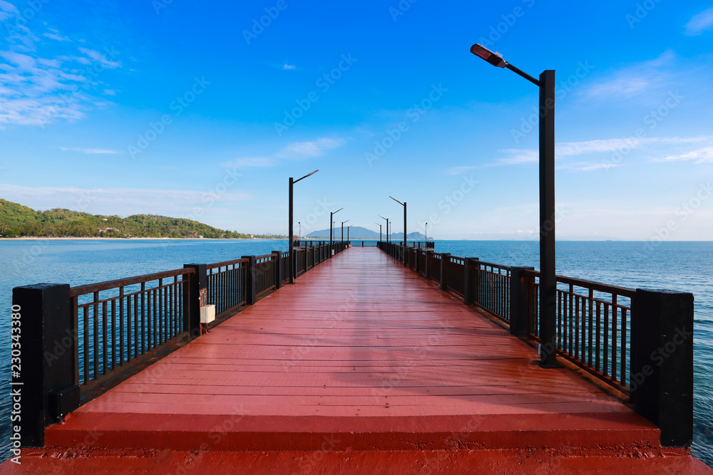 red bridge or port with blue sky and beautiful sea view
