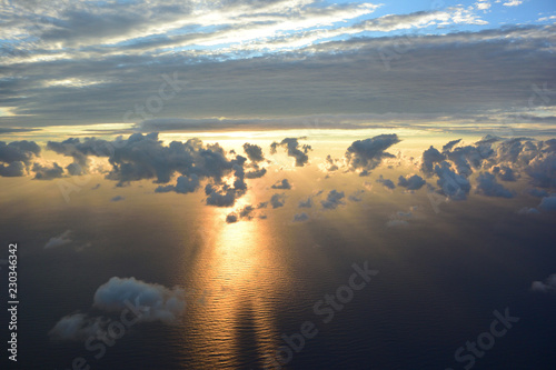 View of sea and clouds from an airplane window