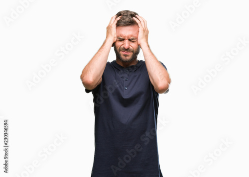Young handsome man over isolated background suffering from headache desperate and stressed because pain and migraine. Hands on head.