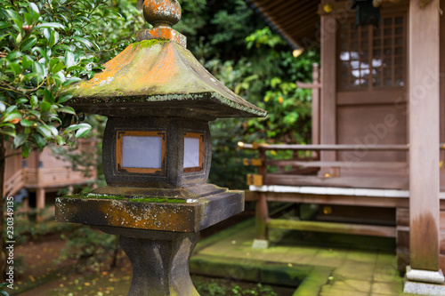 Stone lamp in Japanese temple in the garden © leungchopan