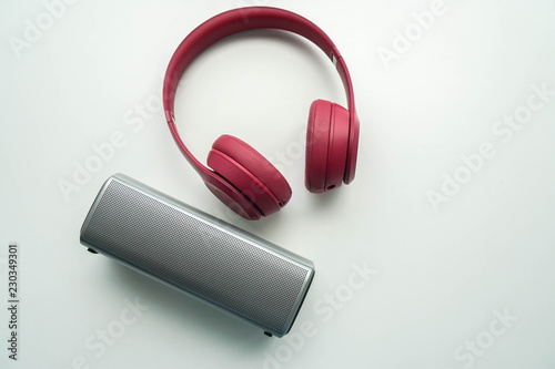 isolated cute pink portable headphone with bluetooth speaker for connections