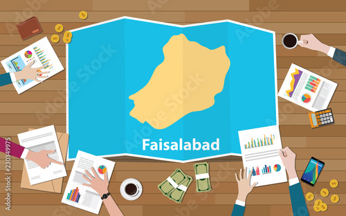 faisalabad punjab pakistan city region economy growth with team discuss on fold maps view from top