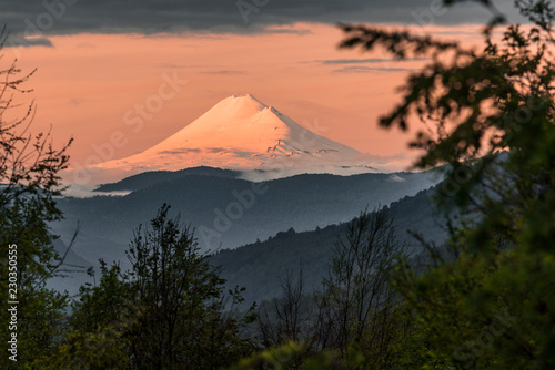 Volacano Llaima in the Araucania Region near Pucon, Chile - Photographed at Sunset.   photo