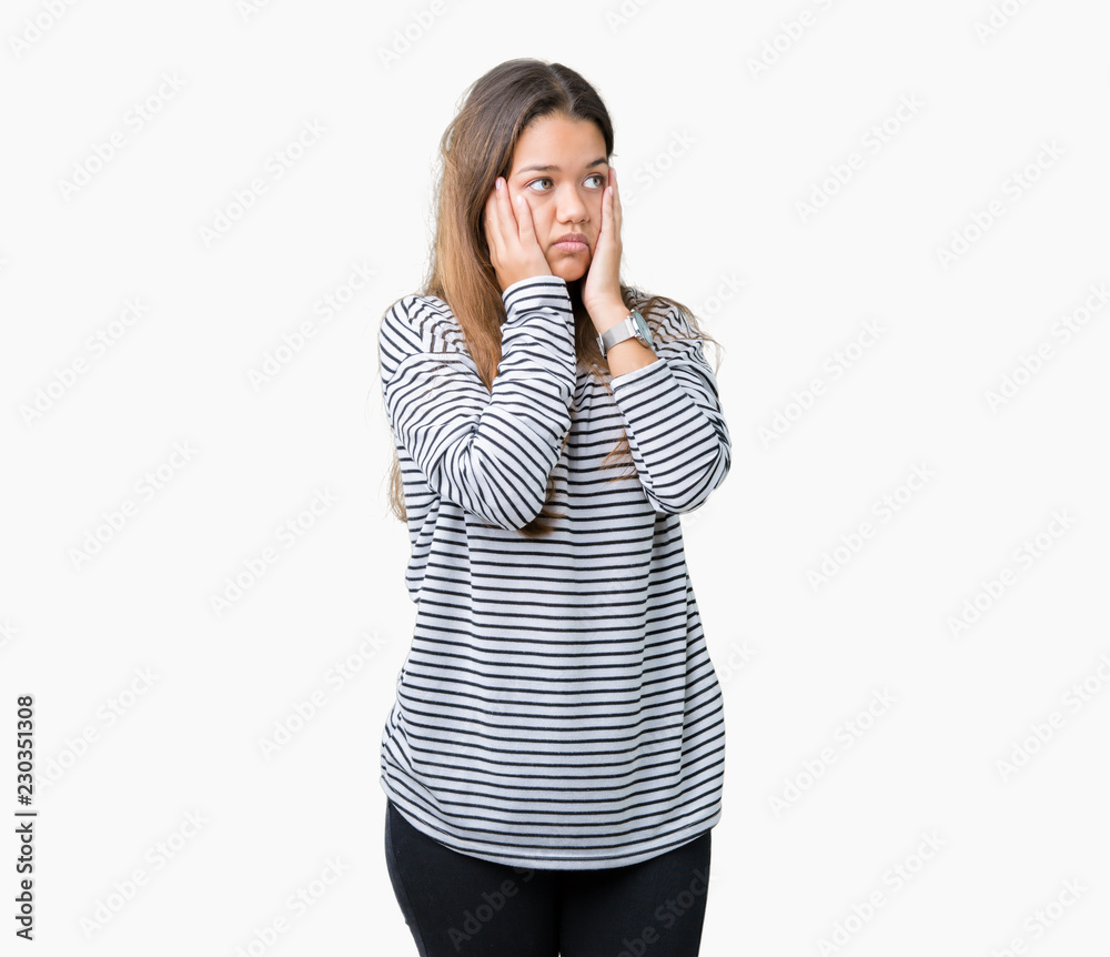 Young beautiful brunette woman wearing stripes sweater over isolated background Tired hands covering face, depression and sadness, upset and irritated for problem Young beautiful brunette woman wearing stripes sweater over isolated background Tired hands covering face, depression and sadness, upset and irritated for problem