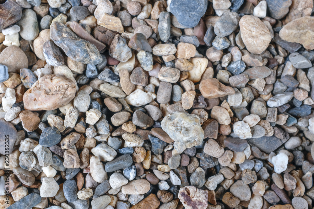 Collection of various size of natural river rocks and pebbles background texture Collection of various size of natural river rocks and pebbles background texture
