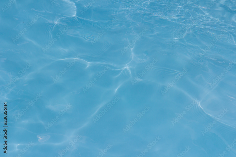 Blue pool water texture reflection background