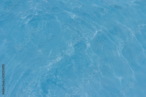 Blue pool water texture reflection background