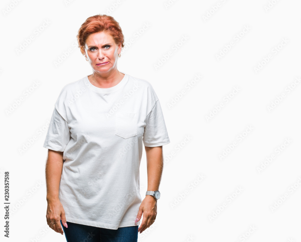 Atrractive senior caucasian redhead woman over isolated background depressed and worry for distress, crying angry and afraid. Sad expression. Atrractive senior caucasian redhead woman over isolated background depressed and worry for distress, crying angry and afraid. Sad expression.