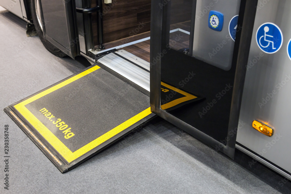 platform for wheelchairs in the cabin of a modern and comfortable city ...